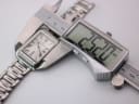 Digital caliper measuring the case width of the watch at 26.20mm.