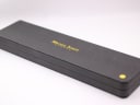 Top view of the original Michel Jordi black presentation box, featuring the brand name and logo on the lid.