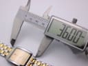 Digital caliper measuring the lug-to-lug length (or overall case length) of the Rado Diastar watch, displaying 36.00mm.