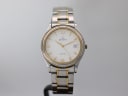 Front view of Zenith Espada two-tone watch with white dial, gold indices, and integrated bracelet.