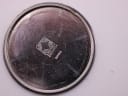 Interior view of the Zenith watch case back, displaying the engraved Zenith logo and Swiss mark.