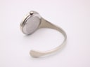 Rear view of the Bijoux Birk watch, showing the brushed finish of the case back and the elegant curve of the integrated silver cuff bangle.