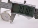 Digital caliper measuring the Bijoux Birk watch case, showing a diameter of 30.10 mm.
