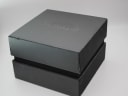Exterior view of the original black Movado presentation box, showing the Movado logo embossed on the lid.