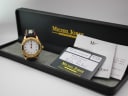 Michel Jordi watch displayed with its original branded box and included papers, including a guarantee card.