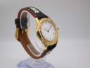 Opposite angled side view of the Michel Jordi watch, highlighting the unique case and strap design.