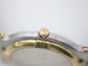Close-up of the gold-plated crown of the Gucci 9000 M, featuring the iconic interlocking Gs logo.