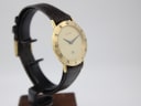 Another side profile view of the Gucci 3000 M watch on a display stand, displaying the case profile and strap texture.