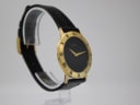 Another angled view of the Gucci watch, showcasing the bezel details and the strap texture.