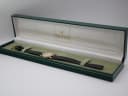 The Gucci 3400 L watch presented in its original green Gucci branded box, with the lid open.