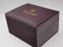 Closed Sandoz original brown leatherette box with "Sandoz Swiss Quality Since 1870" gold lettering.