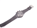Full length view of the Gucci 126.2 watch from the back, showing the case back and strap underside.