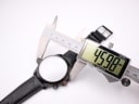 Digital caliper measuring the case diameter of the Gucci 126.2 watch, showing a reading of 45.98mm.
