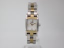 Front view of the Tissot T042109 A two-tone rectangular watch with a white dial and gold-tone accents.