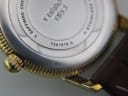 Close-up of the stainless steel case back with "TISSOT 1853", "T031210 A", "SAPPHIRE CRYSTAL", and "STAINLESS STEEL" engravings.