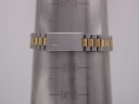 The two-tone bracelet of the Tissot Seastar D 311 on a wrist sizing cone, indicating a circumference measurement of 188mm (18.8cm).