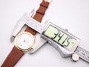 Digital caliper measuring the Mappin & Webb watch case diameter at 34.15mm.