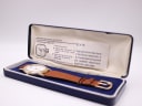 The Mappin & Webb watch inside its original blue presentation box with instruction papers.