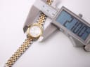 Digital caliper measuring the Tissot PR 100 case diameter at 21.00mm.