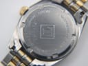 Case back of the Tissot PR 100 showing "SAPPHIRE CRYSTAL", "WATERRESISTANT 50 M", "P 320/420", and "STAINLESS STEEL" engravings.