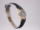 Another angled side view of the Raymond Weil watch, showing the case profile and black leather strap