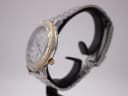 Side profile view of the Accurist watch, highlighting the gold-tone ribbed bezel and crown.