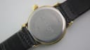 Close-up of the stainless steel case back of the Tissot C226K, showing 'TISSOT C226K', 'WATERRESISTANT 30M', 'MINERAL GLASS', and 'STAINLESS STEEL' engravings.