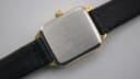 Case back of the Bulova watch, showing "BULOVA BASE METAL BEZEL STAINLESS STEEL BACK G7A" engraving.
