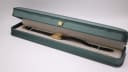 Bulova watch displayed in a green presentation box, highlighting its elegant form.