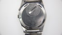Case back of the Seiko 7223-6010 showing serial number, model reference, and 'stainless steel' engraving.