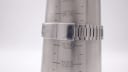 Stainless steel bracelet of the Seiko watch on a wrist sizing gauge, showing a circumference of 19.8cm.