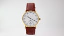 Full front view of the Mappin & Webb quartz watch on a brown leather strap against a white background.