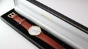 Mappin & Webb watch displayed in a generic black presentation box (not original).