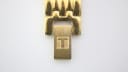 Close-up of the gold tone bracelet's signed fold-over clasp, featuring the Tissot 'T' logo.