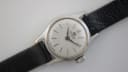 Close-up of the Bucherer watch dial, clearly showing 'BUCHERER 17 JEWELS' logo, silver baton indices, and 'SWISS MADE' text.