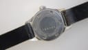 Detailed close-up of the watch case back, engraved with 'WATERPROOF', 'ANTIMAGNETIC', 'STAINLESS STEEL', 'SWISS MADE', and serial number '109344'.