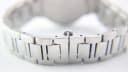 Close-up view of the underside of the stainless steel integrated bracelet, showing the hidden butterfly clasp mechanism.