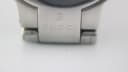 Close-up of the integrated stainless steel bracelet of the Gucci 8900 M, showing the signed 'Gucci timepieces' clasp detail.