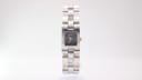 Front view of the Gucci 2305L watch with a square black dial and silver-tone integrated steel bracelet on a white background.