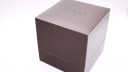 The original brown Gucci presentation box with the "GUCCI" logo embossed on the lid.
