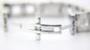Interior view of the deployant butterfly clasp mechanism on the Gucci 2305L's steel bracelet.