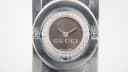 Front view of the Gucci T.1.2 watch showing the brown dial, silver hands, and diamante-set bezel.