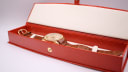 The Royce Leadership 1100 watch nestled inside a red presentation box.