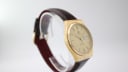 Side profile of the vintage Tissot Seastar Quartz, displaying the slim design of its gold-tone case and crown.