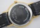 Close-up of the stainless steel case back of the Amara watch, engraved with "3ATM Waterresistant", "Steel Back Swiss", and serial number "667 033".