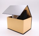 Watch displayed in a generic brown and black presentation box with a raised lid.