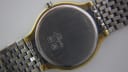 Close-up of the stainless steel case back of the Longines Flagship, showing 'Flagship', 'Stainless Steel', 'Swiss Made', and serial number 2559319.