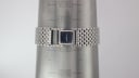 Close-up of the Longines Flagship bracelet on a wrist sizing cone, showing an inner circumference measurement of 177mm.