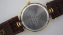 Case back of the Solvil et Titus watch, showing "stainless steel back" and "water resistant" engravings, and serial number 513731.