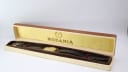 The Rodania 18711 watch presented in its original branded, textured brown and cream box with gold interior.